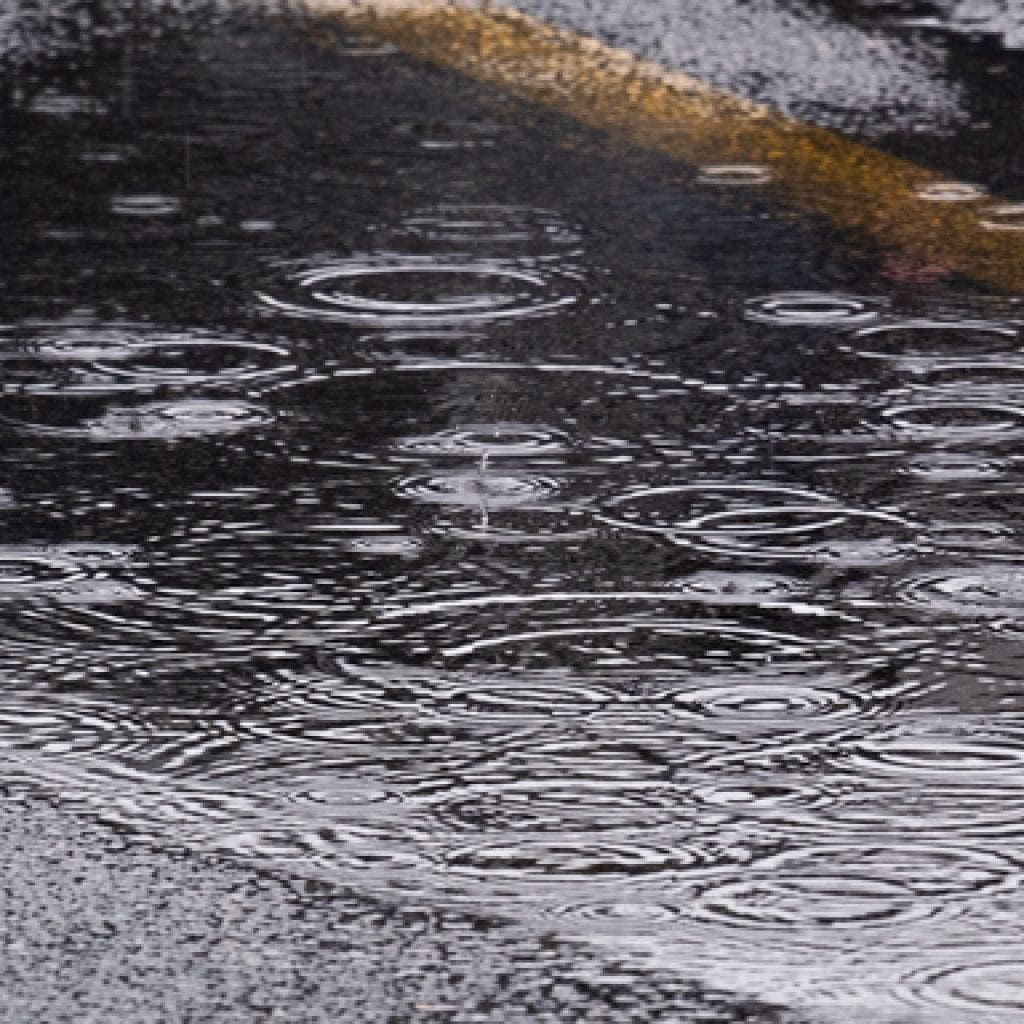 Rain outside on the street.